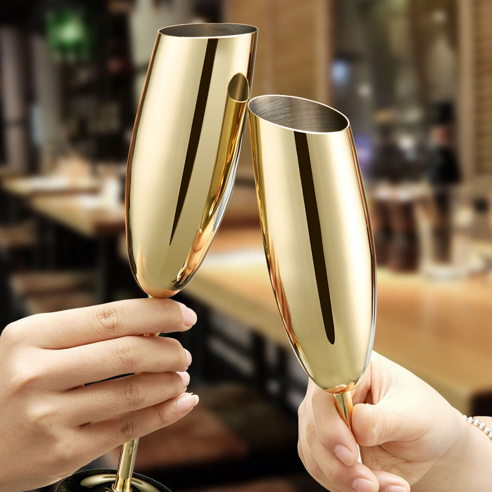 Two People Toasting Using Gold Stainless Steel Champagne Flutes - The Stainless Sipper